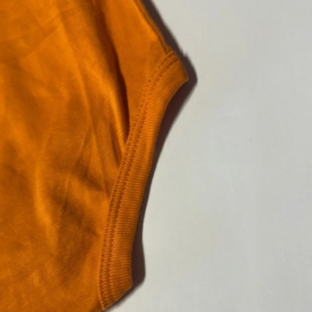 Ralph Lauren Orange Bodysuit with Playful Bear Design